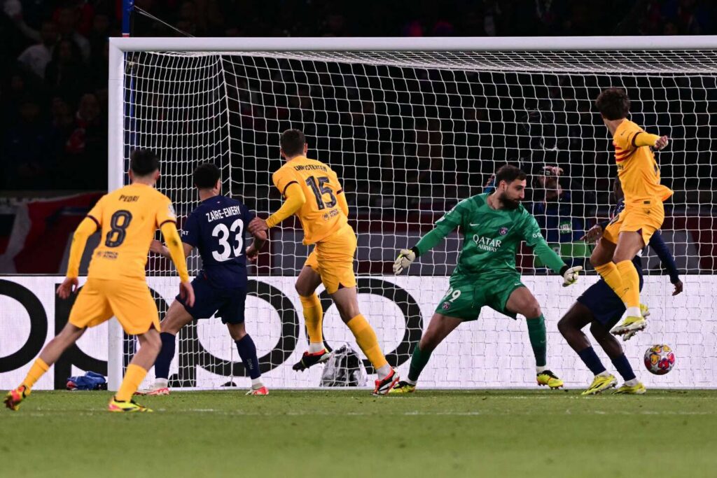 Barcelona's Danish defender #15 Andreas Christensen (3rdL) scores his side's third goal during the UEFA Champions League quarter final first leg football match between Paris Saint-Germain (PSG) and FC Barcelona at the Parc des Princes stadium in Paris on April 10, 2024.  (Photo by Miguel MEDINA / AFP)