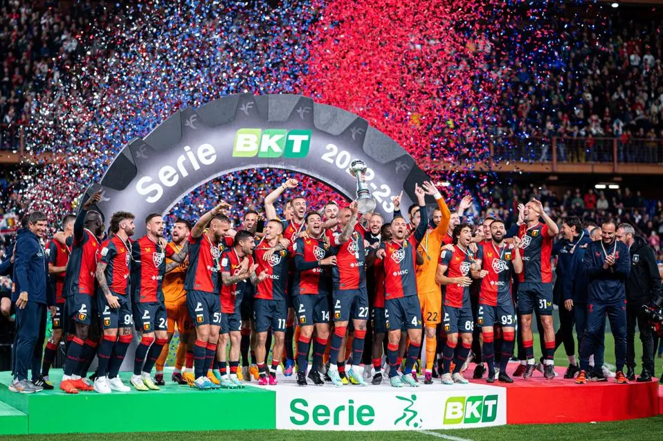 GENOA, ITALY - MAY 19 2024 Players of Genoa celebrate as they are awarded for earning promotion into Serie A 